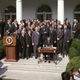 President Lyndon Johnson signs the Economic Opportunity Act on May 21, 1964.
LBJ Library, photo by Cecil Stoughton